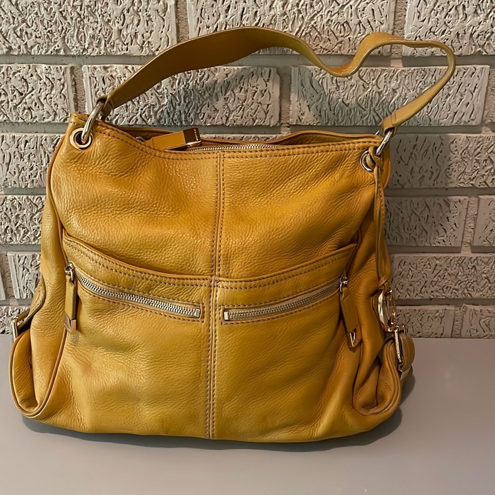 Michael Kors yellow soft pebble leather shoulder handbag, gold buckles & zippers